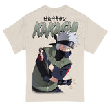 Back view of natural colored graphic tee featuring Jumbo graphic print of Kakashi from Naruto holding his kunai. With Japanese & English text reading "KAKASHI"