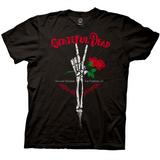 Black t-shirt featuring a skeletal hand making the peace sign while holding a red rose. Above the hand, “GRATEFUL DEAD” is written in bold red text. Below the image, it reads “Carousel Ballroom – San Francisco, CA” with decorative red accents. The design combines gothic and classic Grateful Dead iconography.