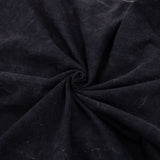 Close-up of fabric spiraled to show weight. Relaxed cotton.