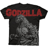 Back of a black Godzilla t-shirt showcasing a grayscale 3/4-body illustration of Godzilla with cracked red “GODZILLA” text across the shoulders.