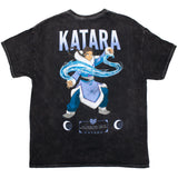 Back view of premium black mineral wash tee with distressed print featuring Katara from Avatar: The Last Airbender.  Large graphic showcases a bold illustration of Katara water-bending with her name in large text above, along with quote reading "I will never, ever, turn my back on people who need me." 