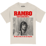 Rambo first blood part II movie t-shirt. Features screenshot from movie of Rambo in the rain and distressed bright red text reading "Rambo, First Blood Part II- No Man, no law, no war can stop him." Vintage movie print on natural (beige) colored tee.