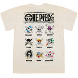 Back view of an off-white One Piece t-shirt featuring the Straw Hat Pirates stylized Jolly Roger designs of each crew member with names and iconic imagery. From top to bottom, left to right: Franky, Sanji, Robin, Zoro, Luffy, Usopp, Brook, Nami, and Chopper.