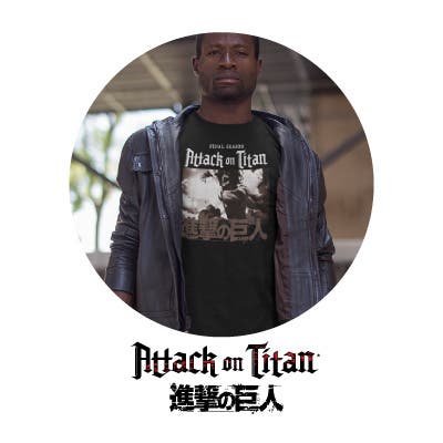 Man wearing black AOT tee with Attack on Titan logo