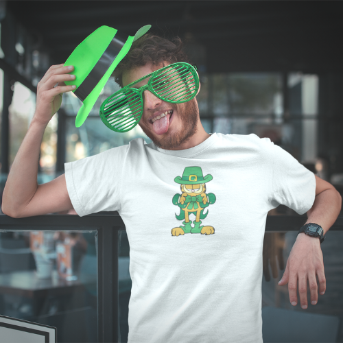 Man wearing green fedora and oversized green stunner shades with a white t-shirt featuring Garfield as a leprechaun